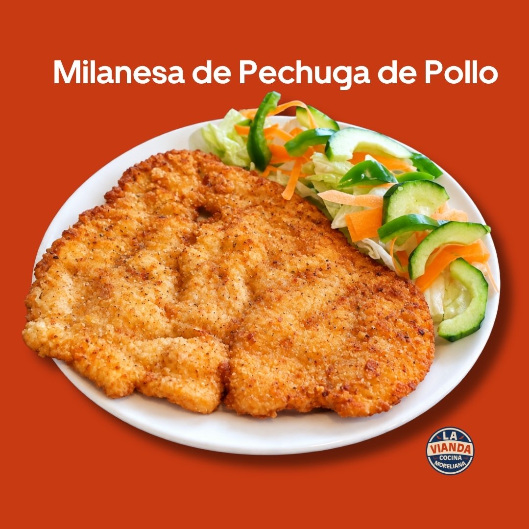 Milanesa de pechuga de pollo empanizada con ensalada fresca, platillo de La Vianda Cocina Moreliana en Morelia. Comida Casera en Morelia