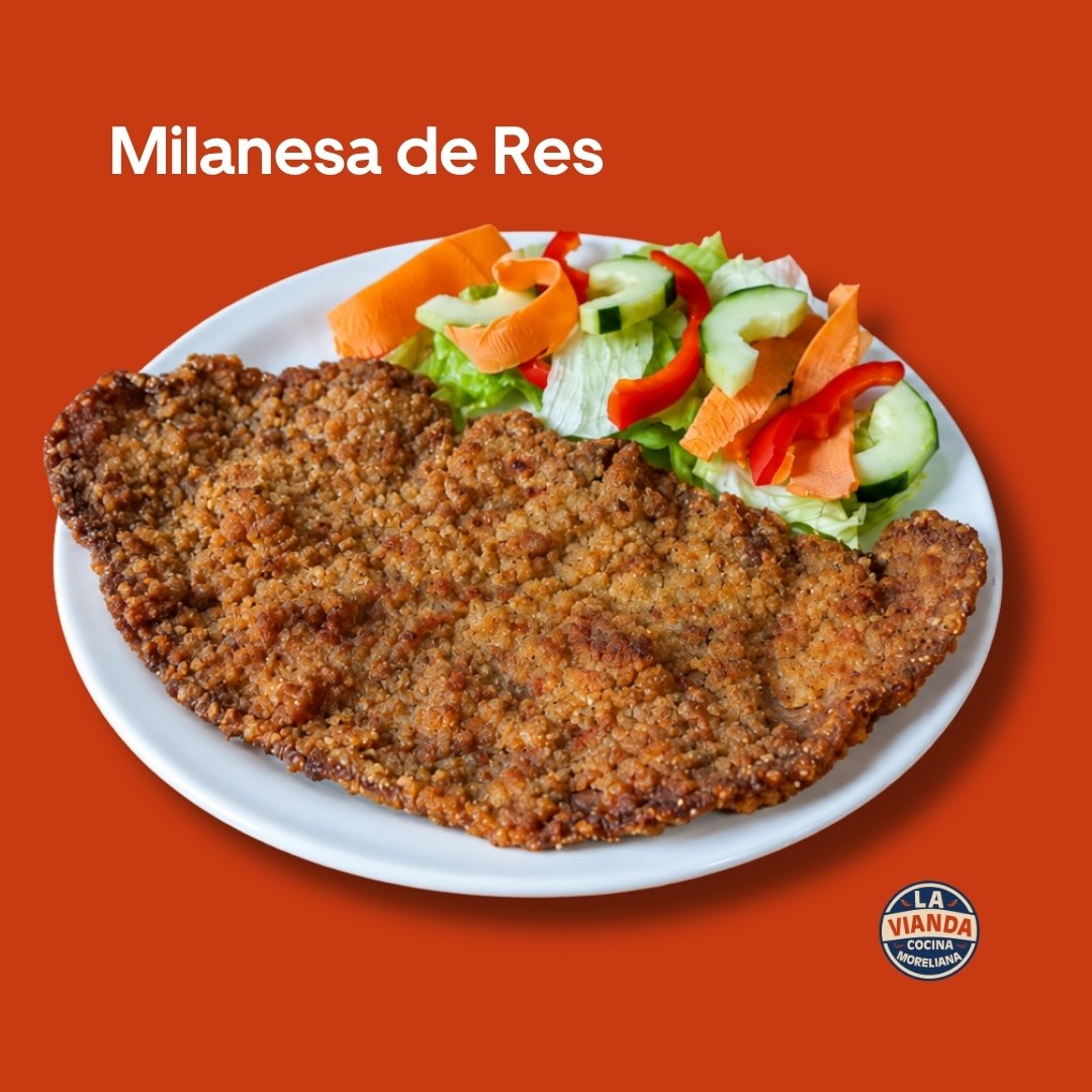Milanesa de res empanizada con ensalada fresca, platillo de La Vianda Cocina Moreliana en Morelia. Comida Casera en Morelia